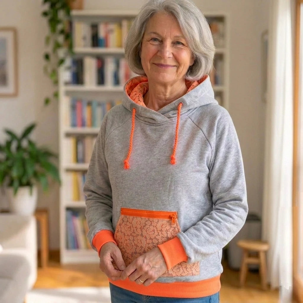 Hellgrauer Hoodie mit neonorangener Kapuze und Kordel
