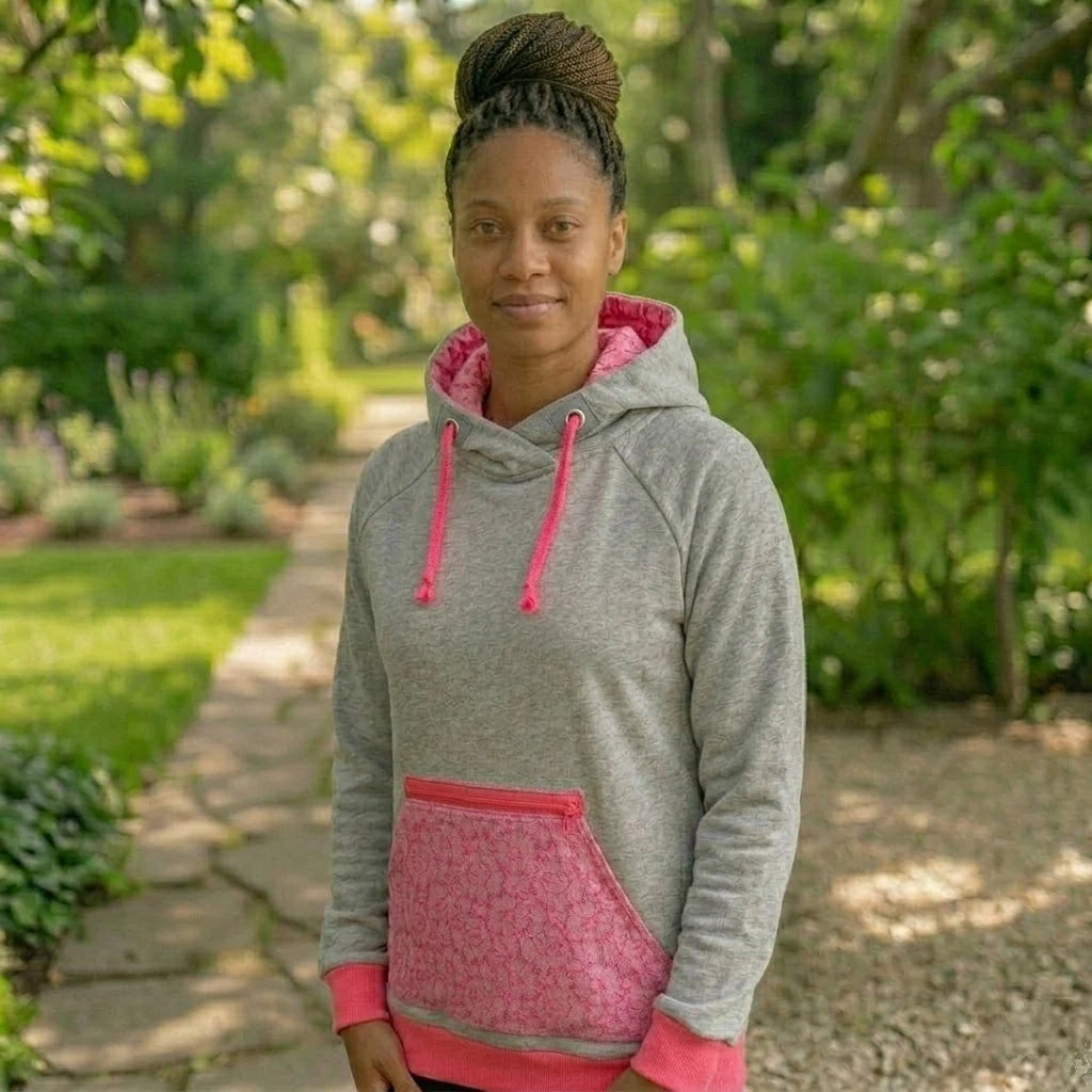 Hellgrauer Hoodie mit neonpinker Kapuze und Kordel